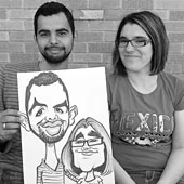A Couple Holding Their Caricature